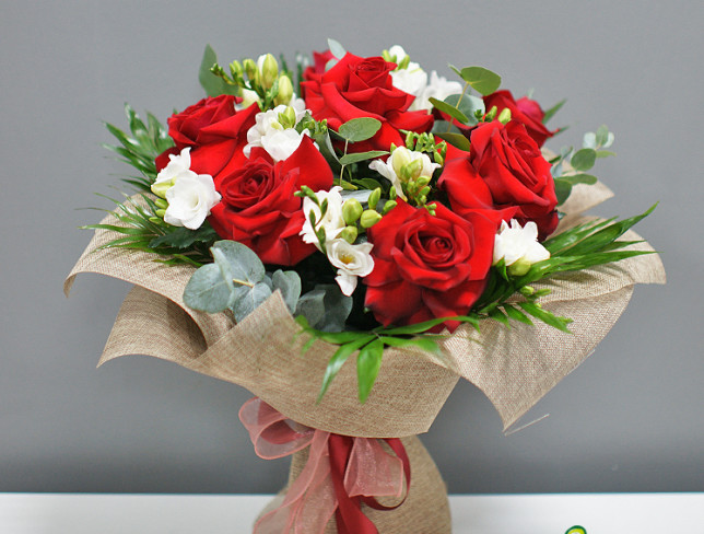 Bouquet of red roses and white freesias photo